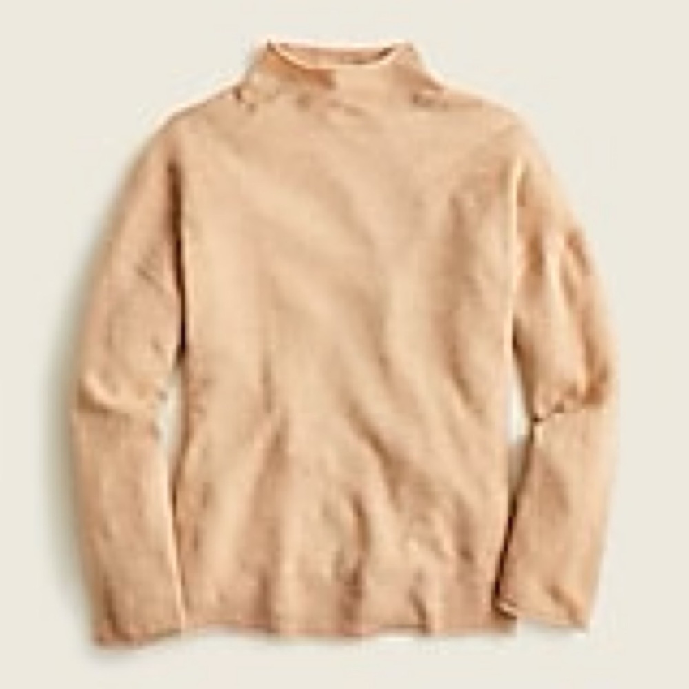 Jcrew Cashmere relaxed roll neck sweater.